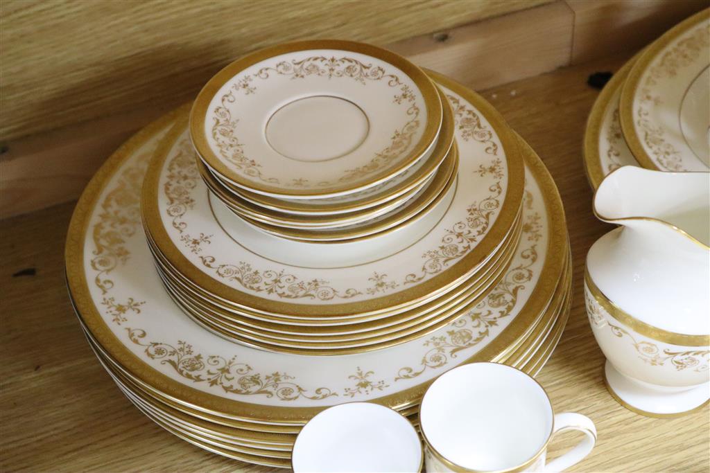 A Royal Doulton Belmont pattern part dinner and coffee dinner service with gilt decoration